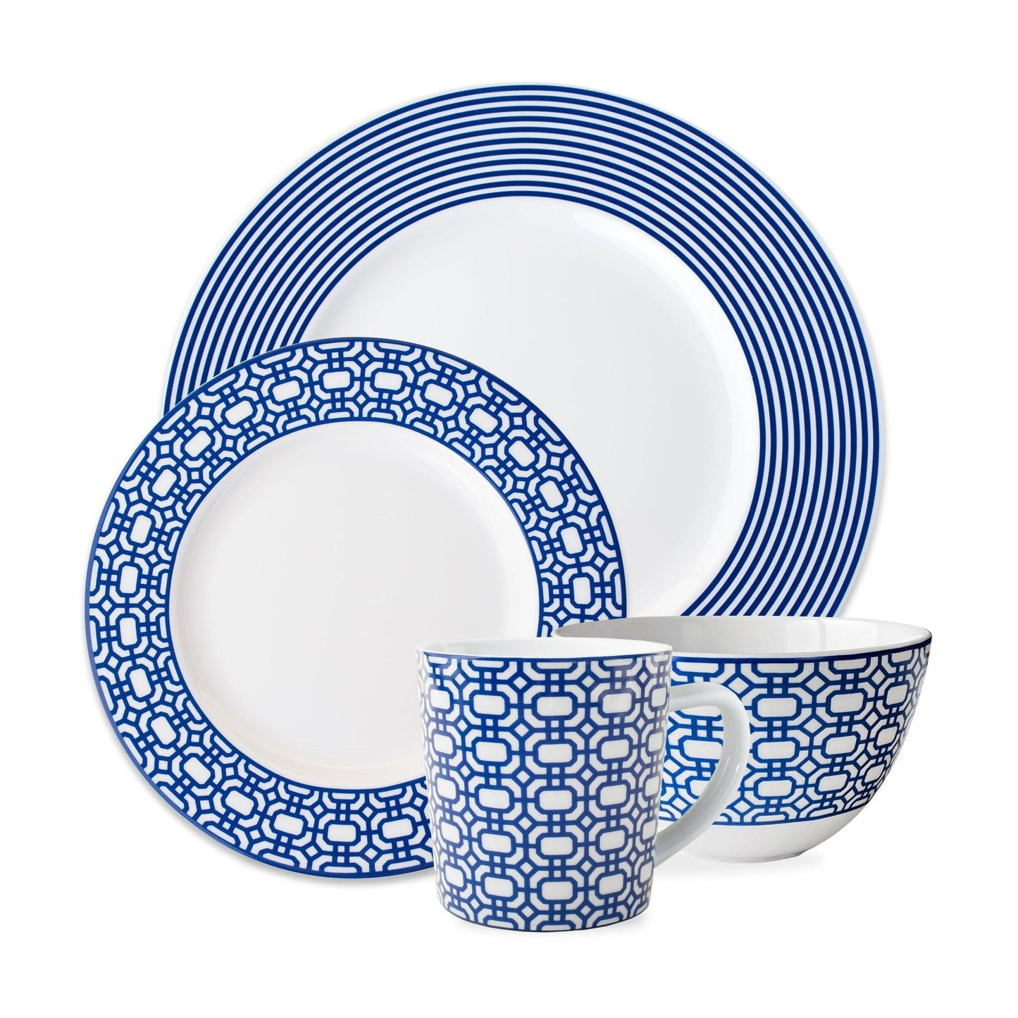 a blue and white dinner set with a cup and saucer