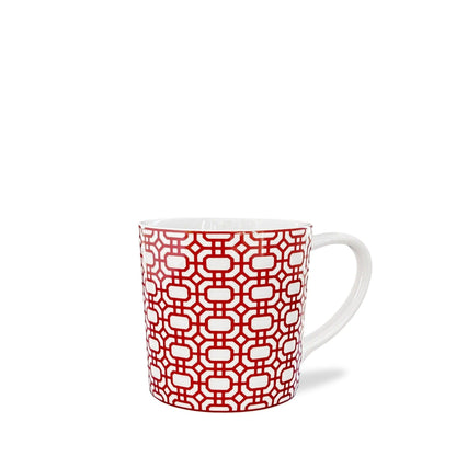 a red and white coffee cup with a pattern on it