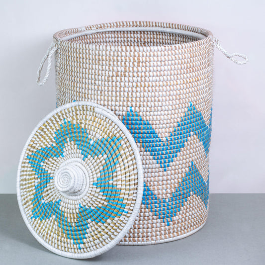a basket with a blue and white design on it