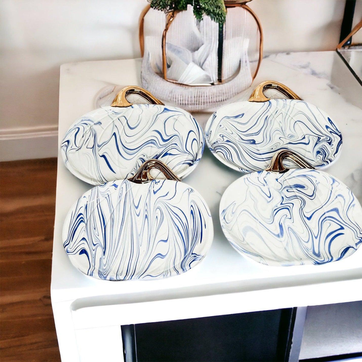 Blue and white pumpkin platter with gold stem
