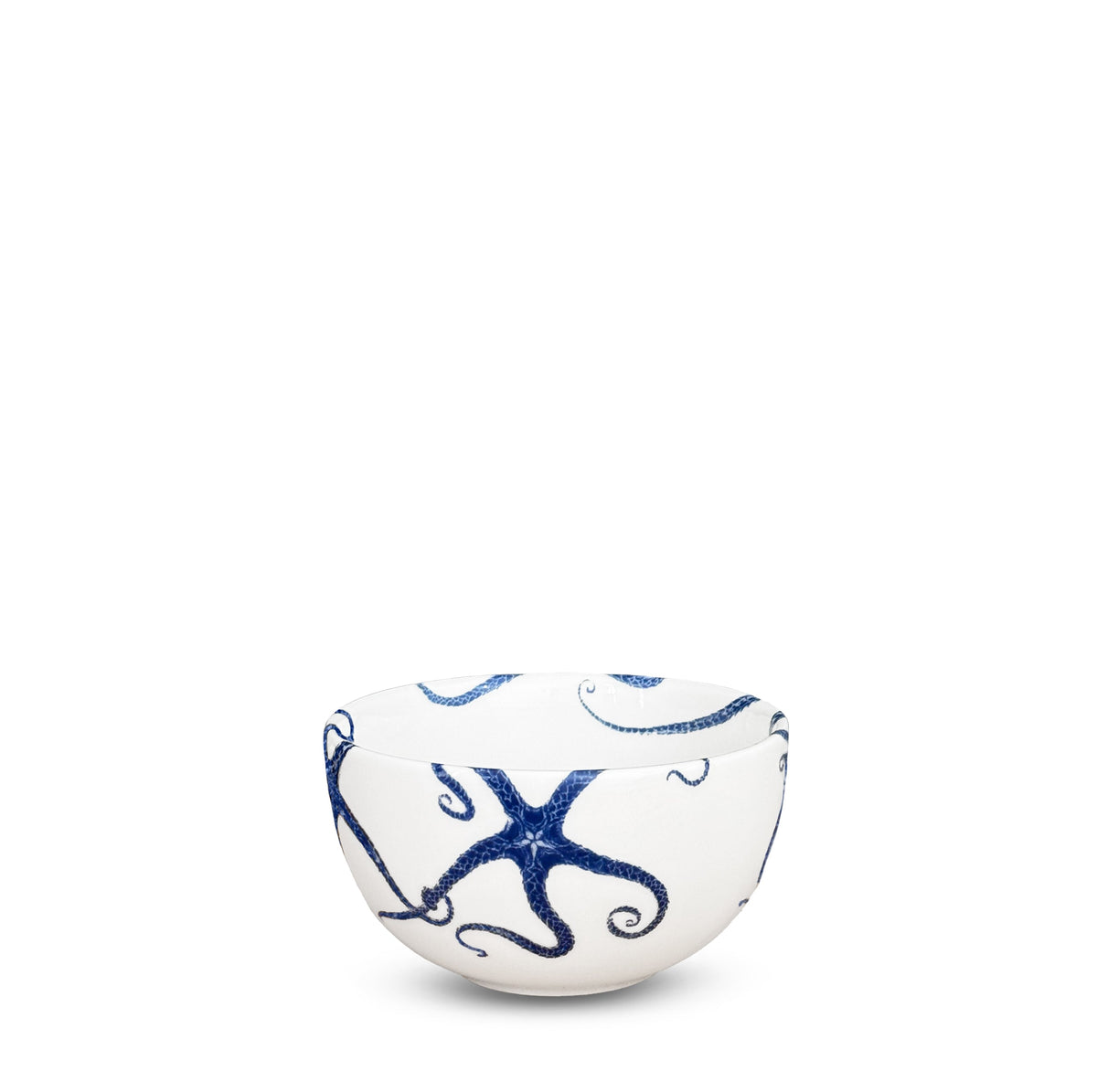 	Caskata white porcelain snack bowl with blue starfish artwork around the exterior and inside the rim