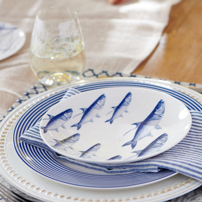 a close up of a plate with fish on it