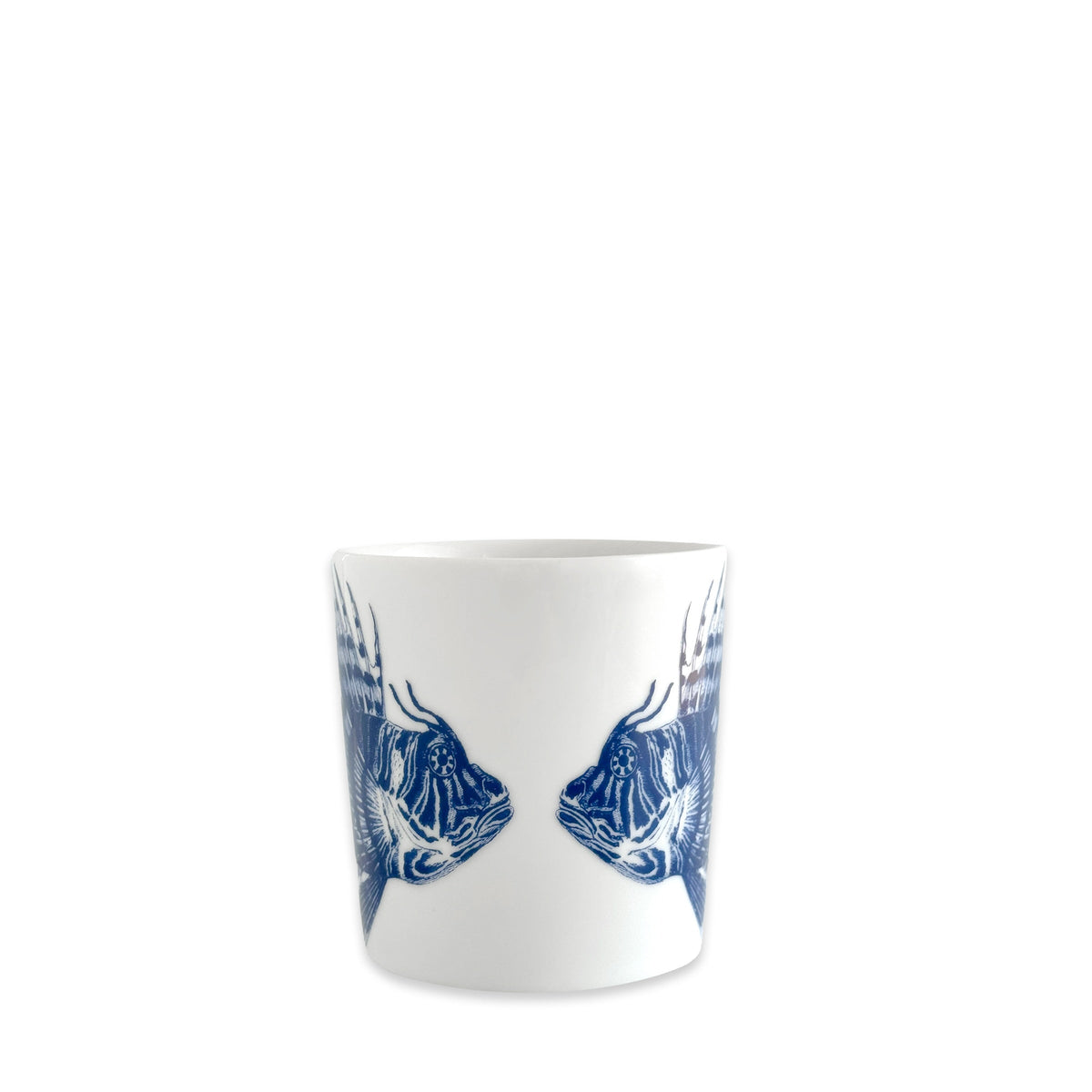 	Alternate view of the Spiky Fish porcelain mug showing blue fish illustrations wrapping around both sides