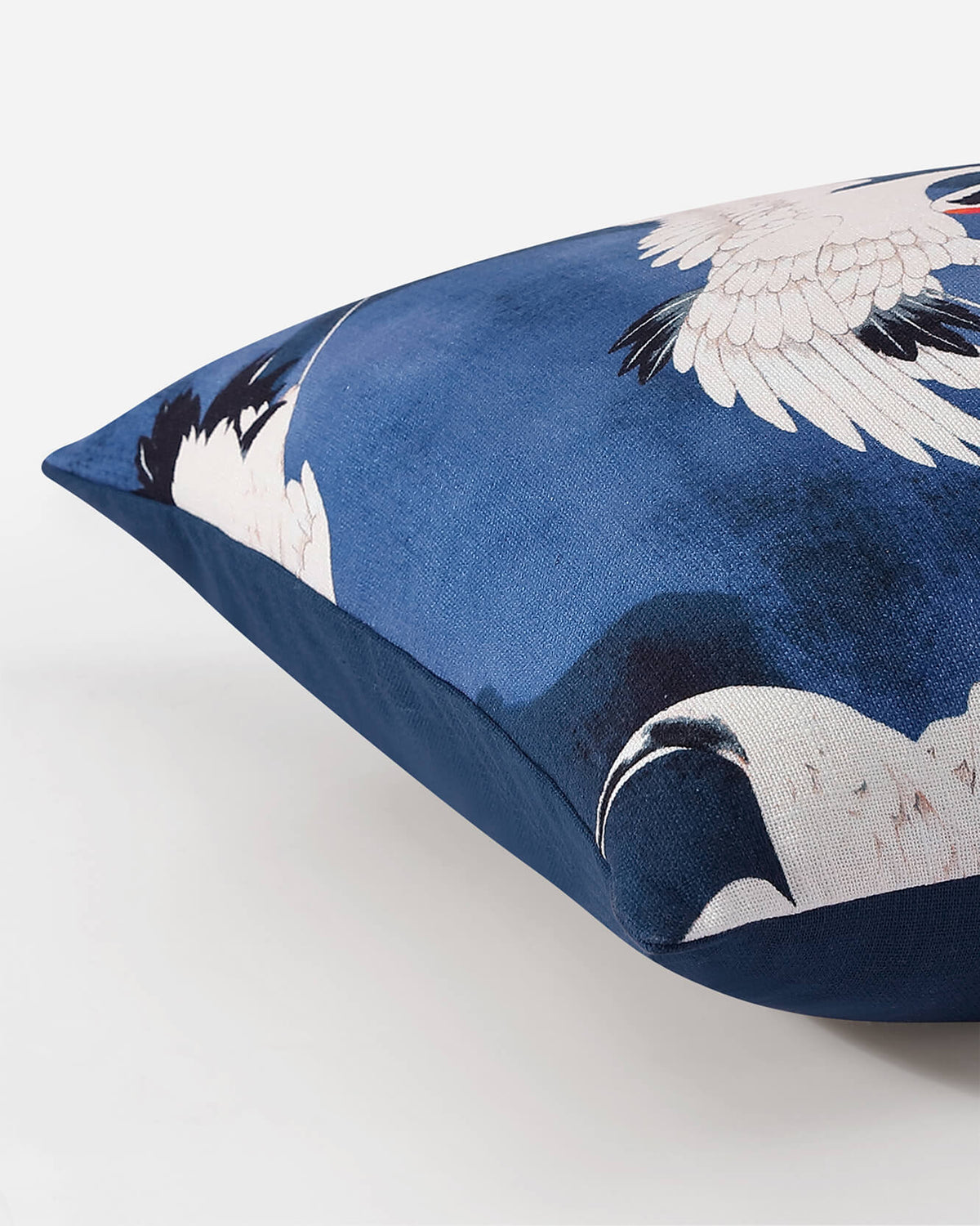 Baritone Blue throw pillow with crane and cloud design