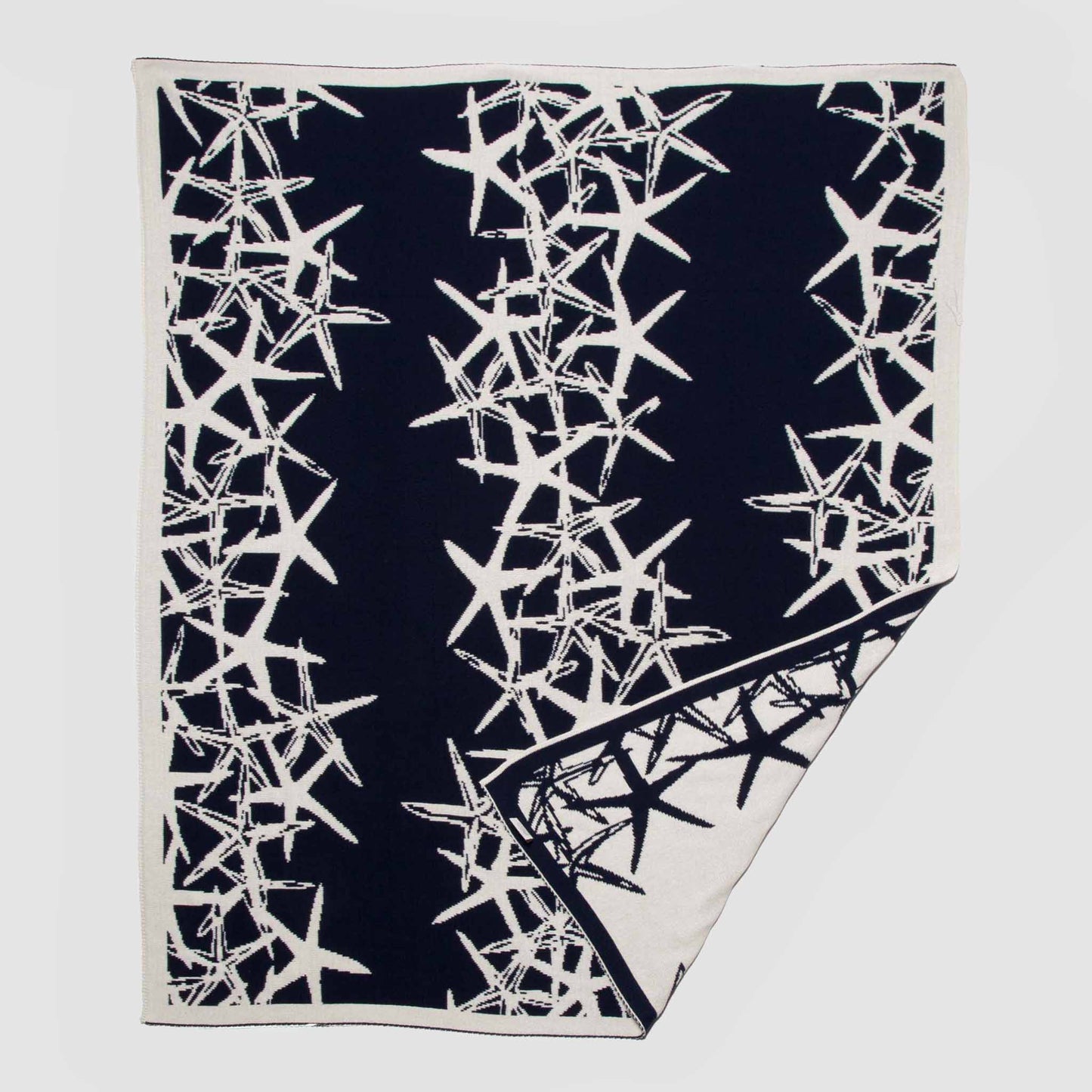 Tumbling Starfish - Reversible Sustainable Coastal Knit Throw Blanket
