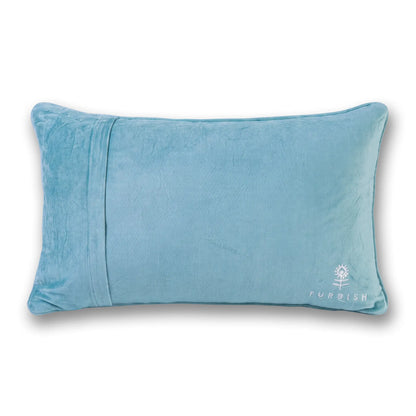 Light blue cotton velvet back of the Very Merry pillow with an embroidered Furbish logo