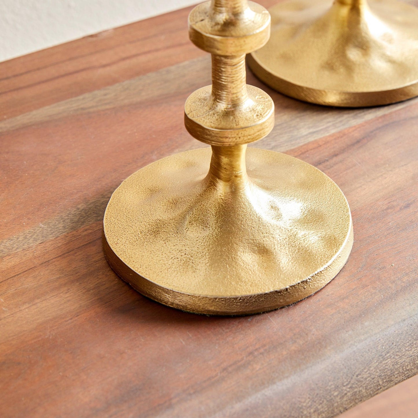 Close up of gold candle stand