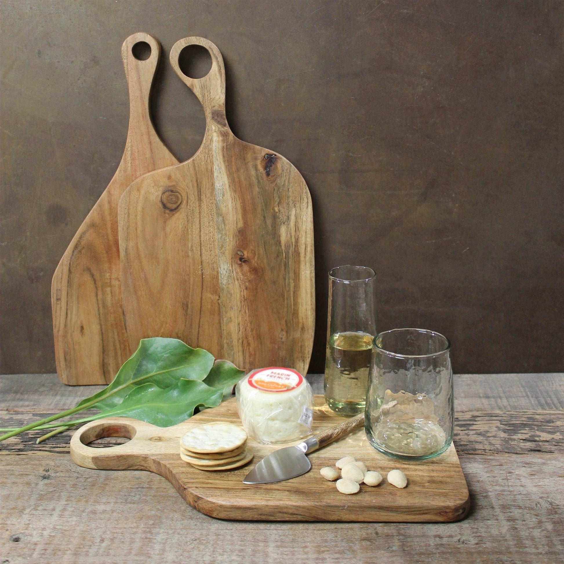 wood cutting boards with cheese and crackers