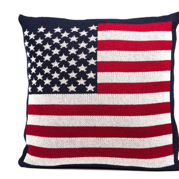 an american flag pillow on a white background