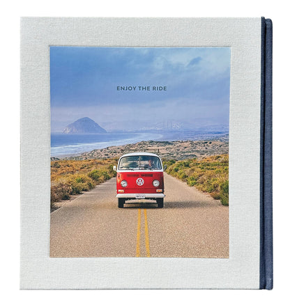 Back cover of Surf Rides showing a red Volkswagen bus on a coastal road beneath the words Enjoy the Ride