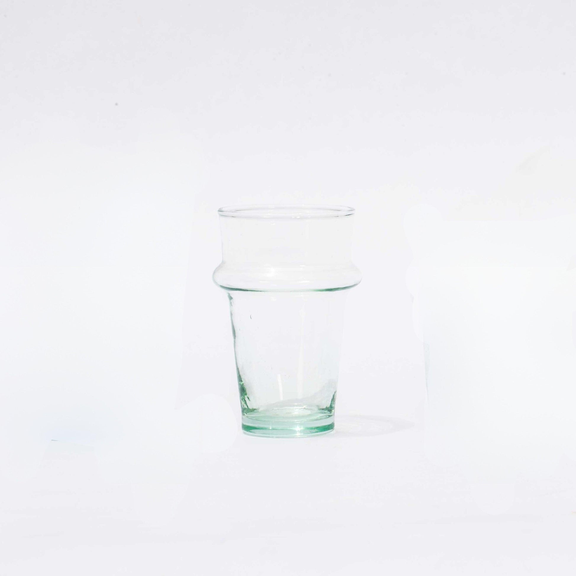 a glass of water on a white background