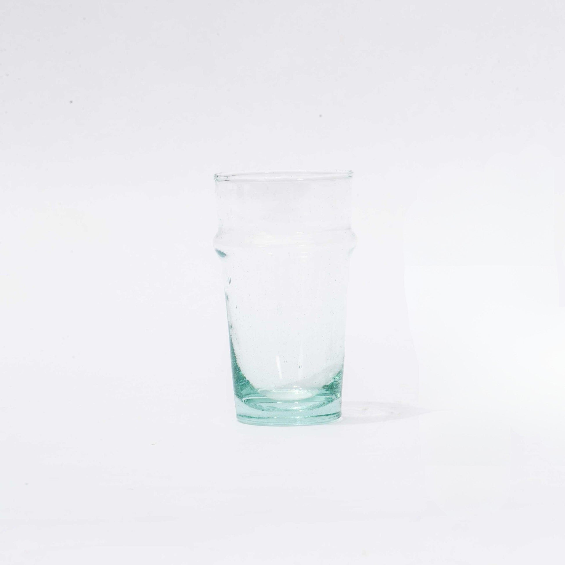 a glass of water on a white background