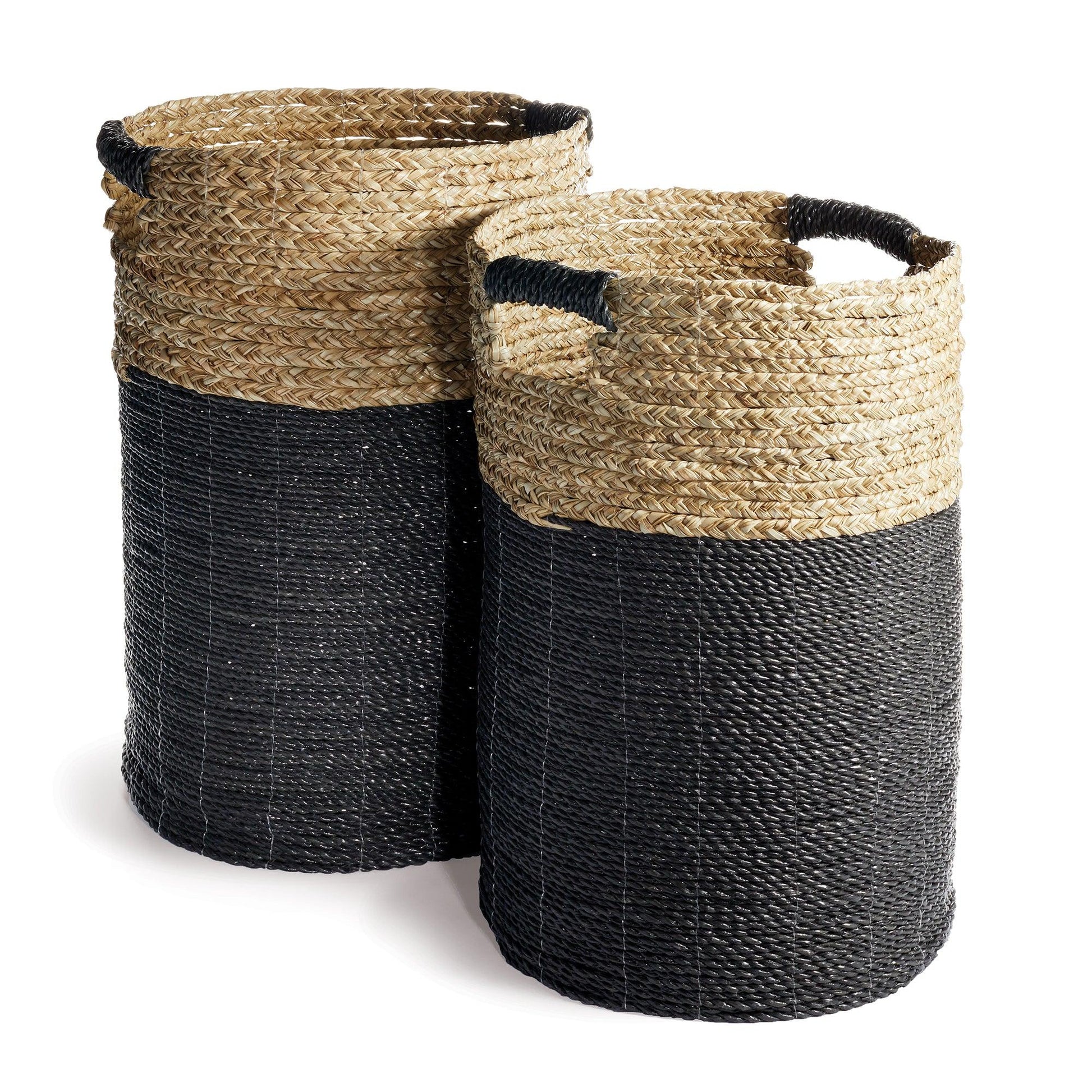 two black and white baskets sitting next to each other