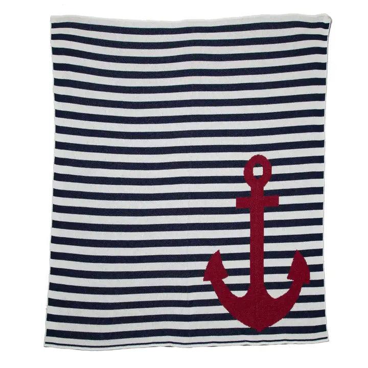 a blue and white striped blanket with an anchor on it