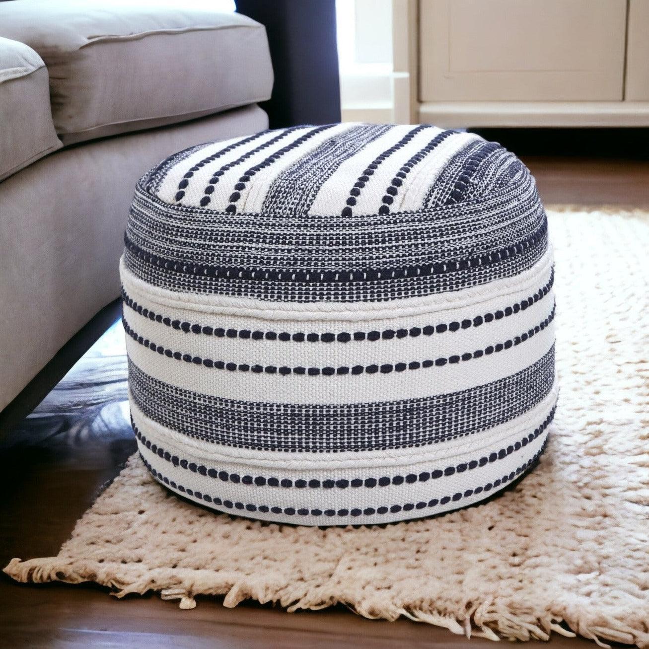 living room with blue and white ottoman