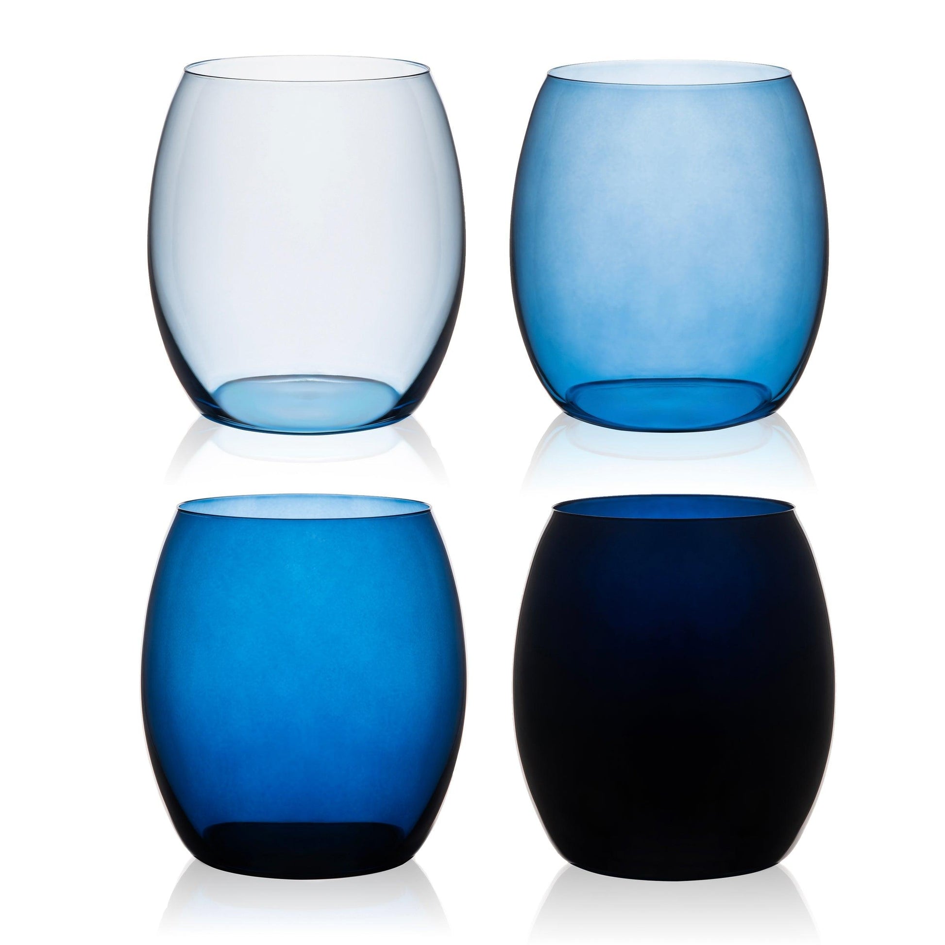 three different colored glass vases sitting next to each other