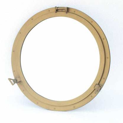a porthole mirror on a white background