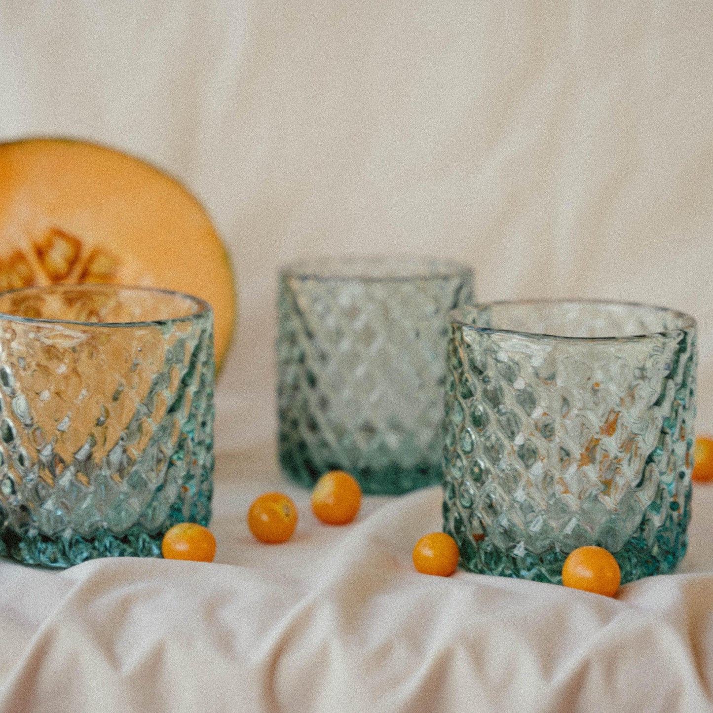 a group of glasses sitting on top of a table