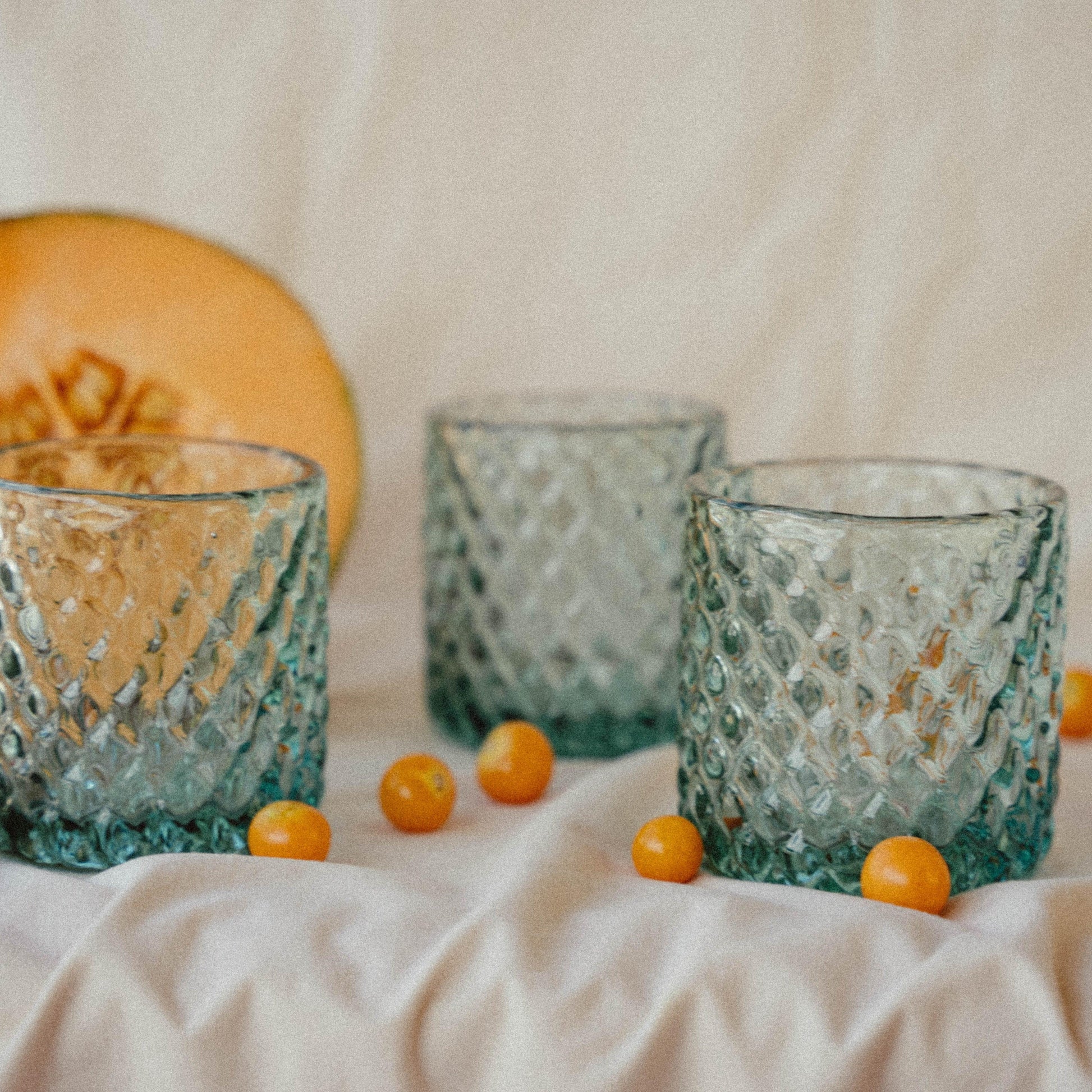 a group of glasses sitting on top of a table