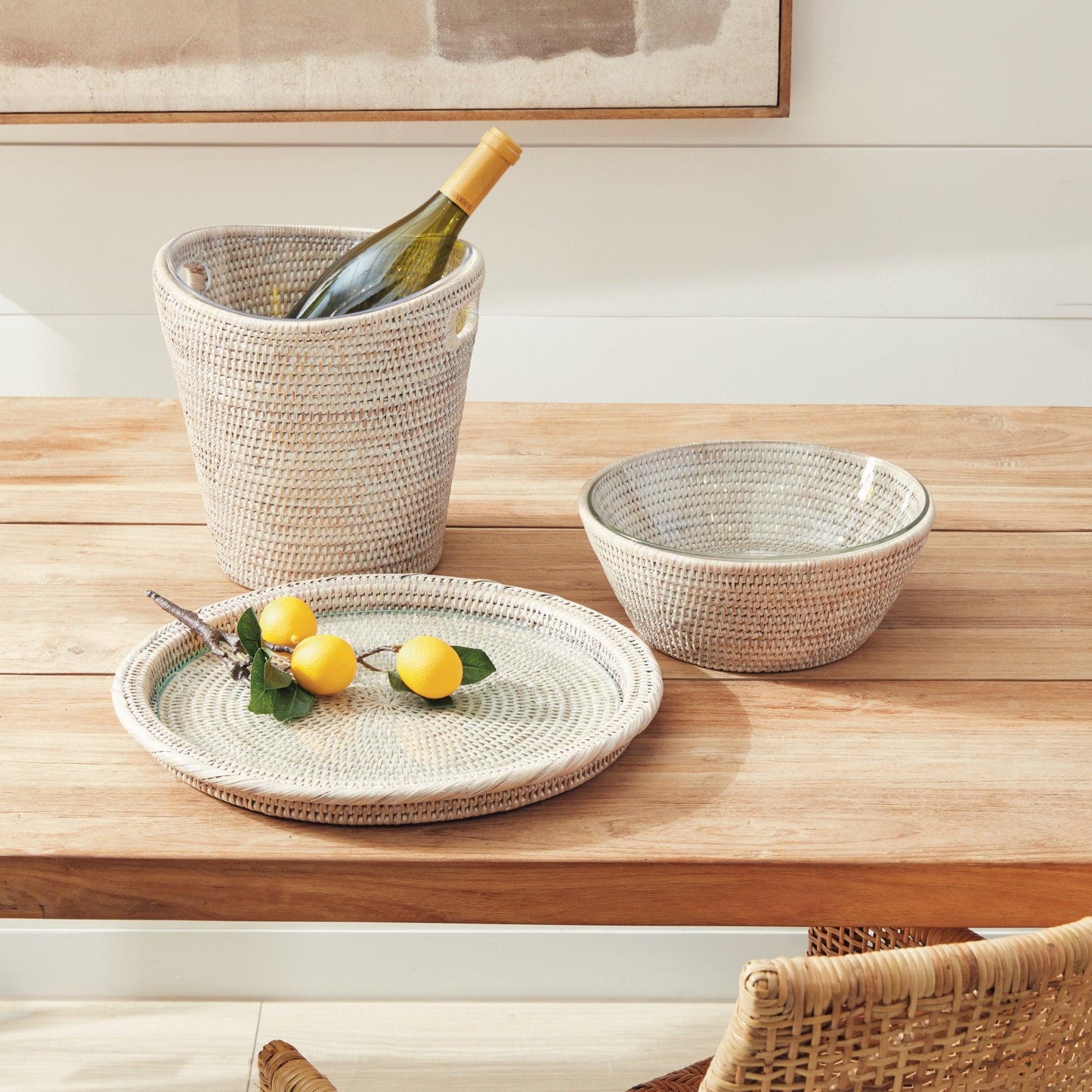 Rattan ice bucket, tray and bowl on wood table 