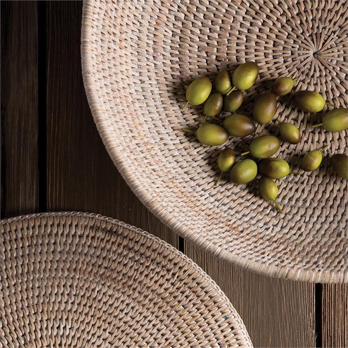 Close up of rattan bowl with olives 