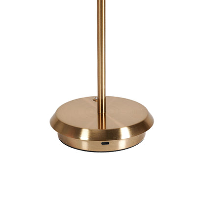 	Close-up of the USB-C charging port on the side of the gold-finish lamp base