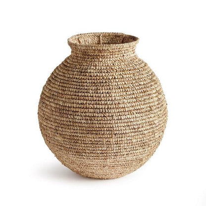 a large woven vase on a white background