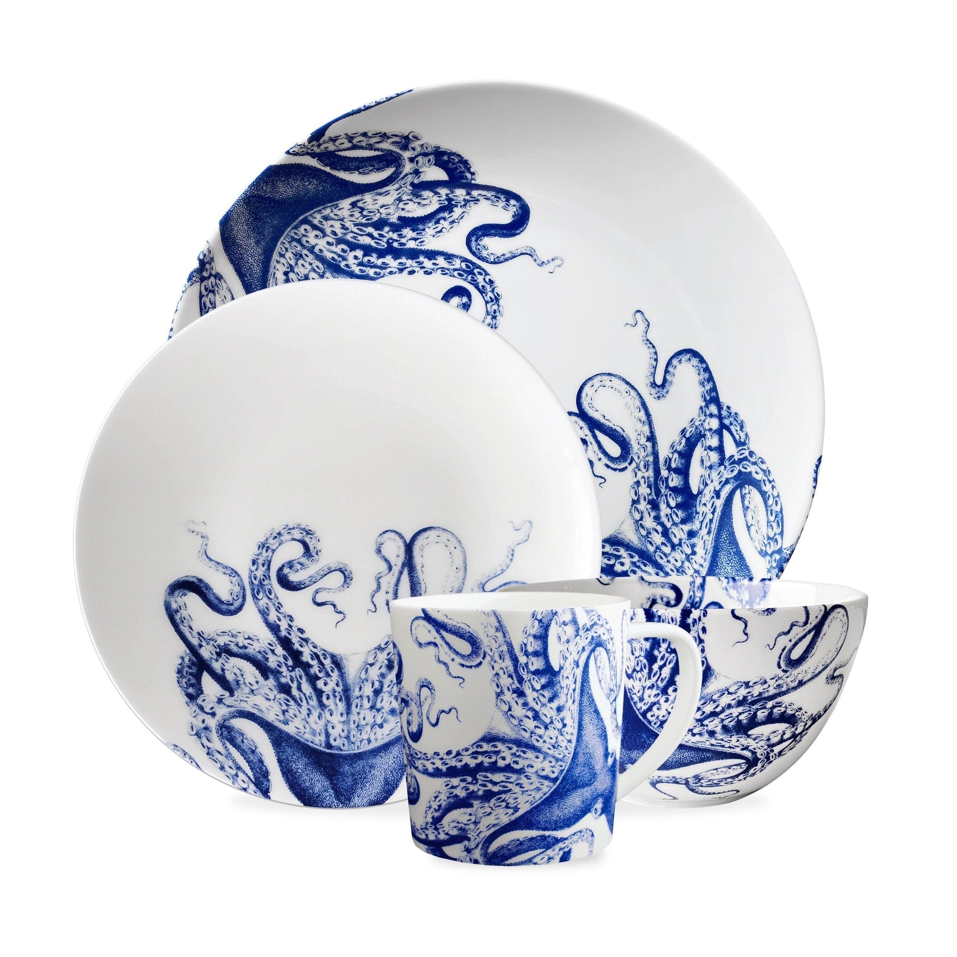 a set of blue and white dishes with an octopus design