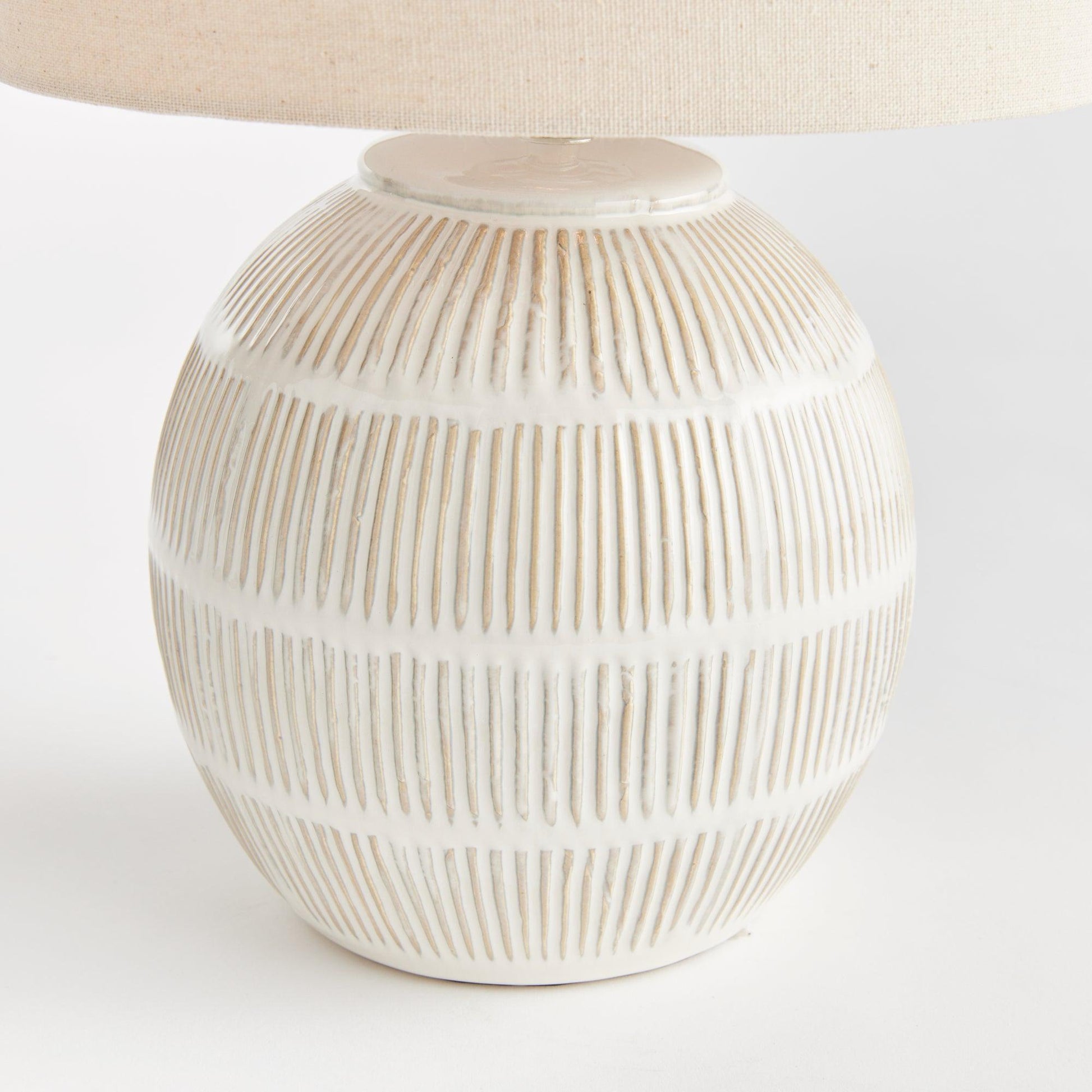 close up of white round lamp