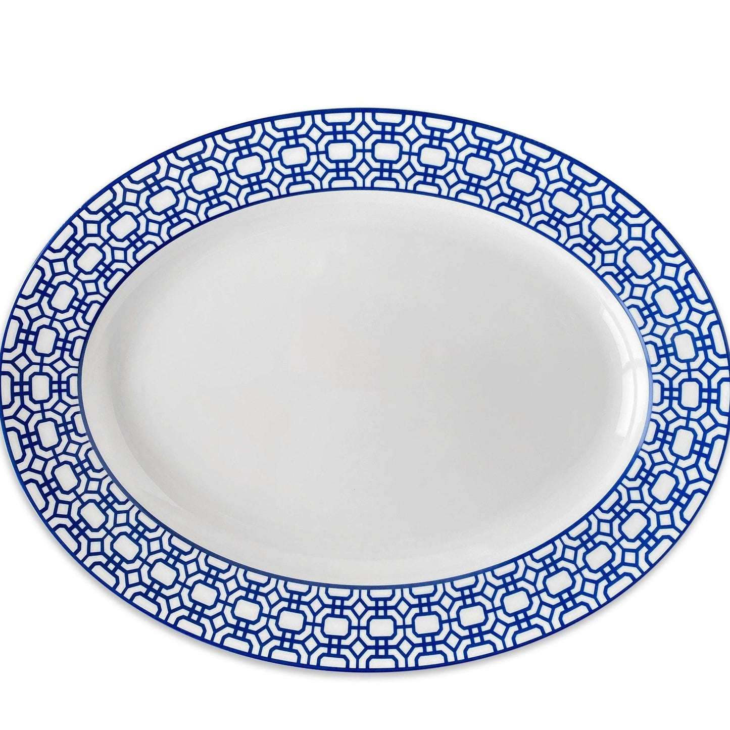 a blue and white plate on a white background