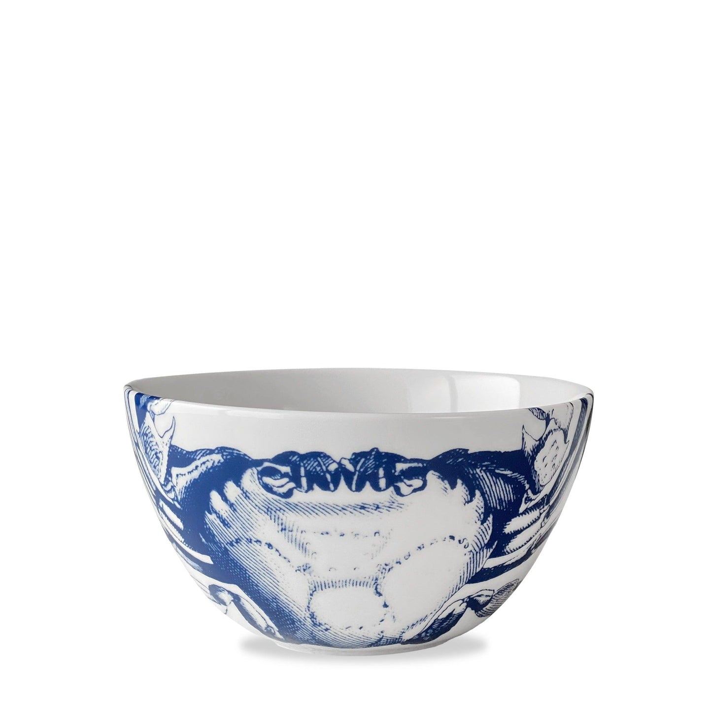 a blue and white bowl with a crab on it