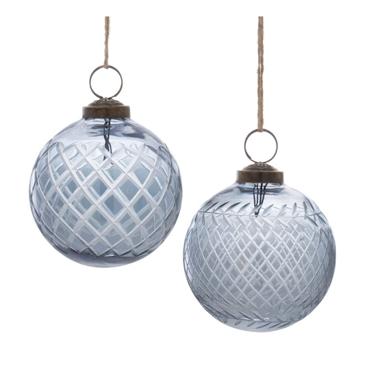 two light blue christmas balls on a string