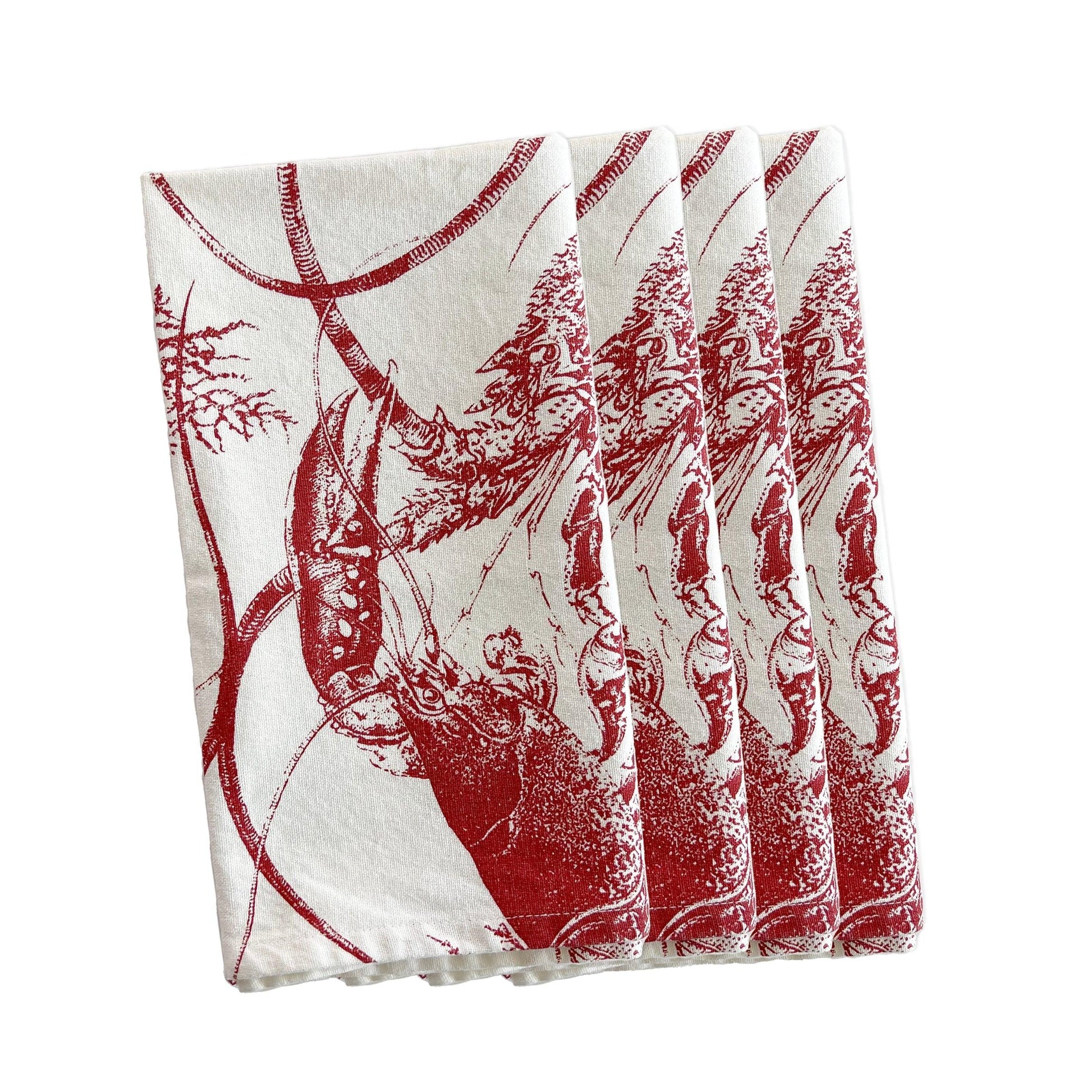 a set of four red and white napkins