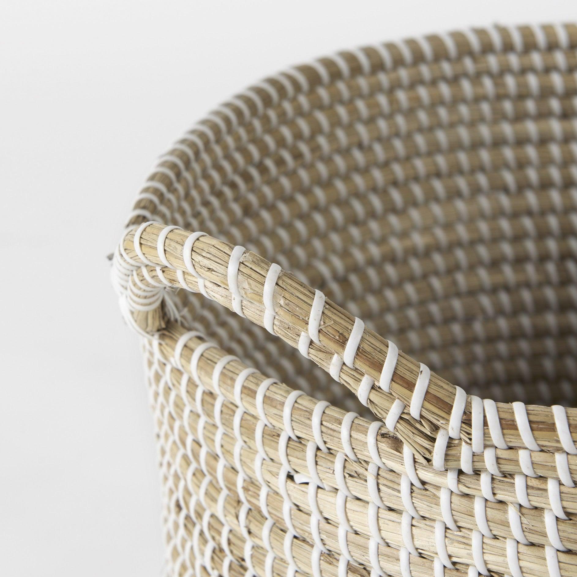 a close up of a wicker basket on a white background