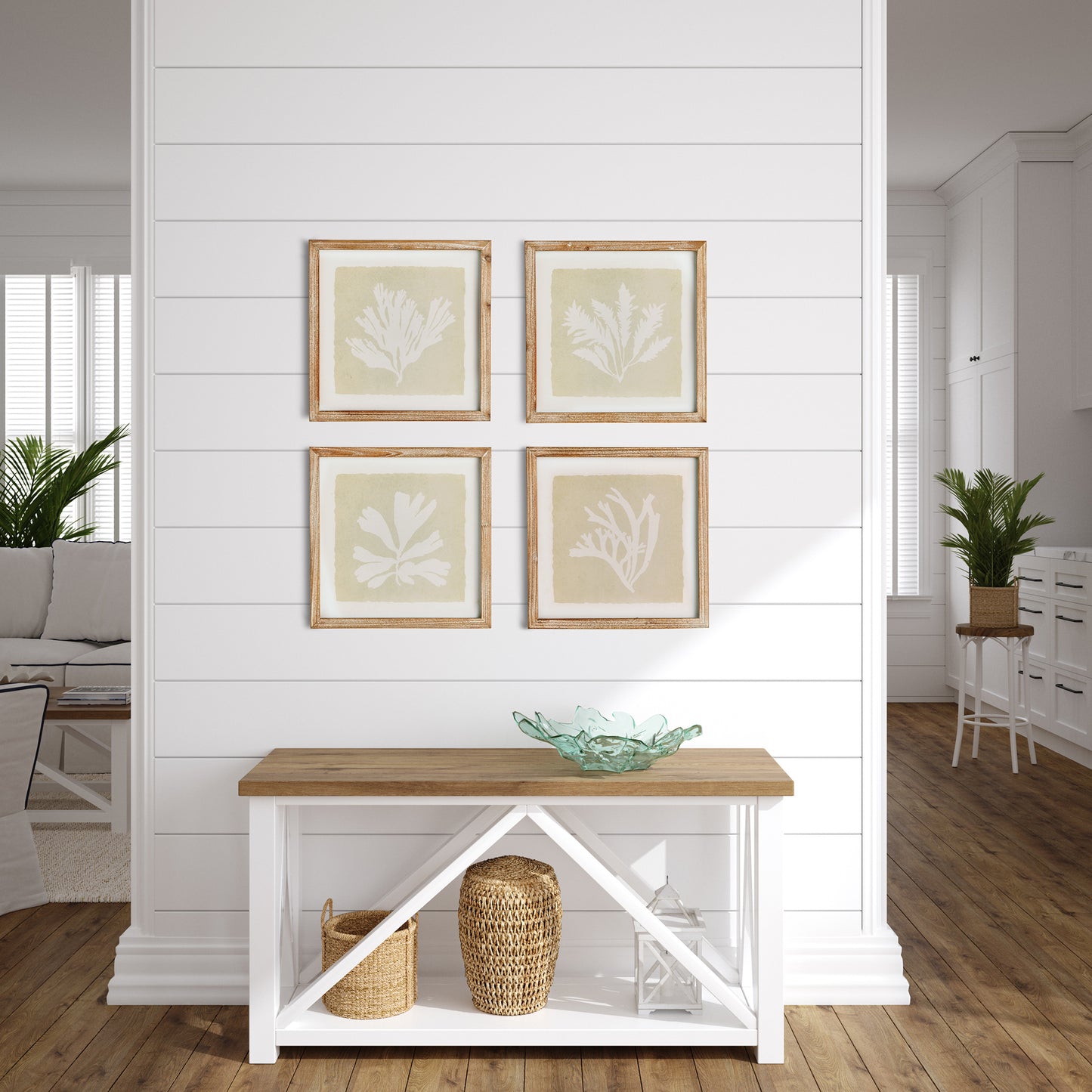 set of four seaweed prints above table in room