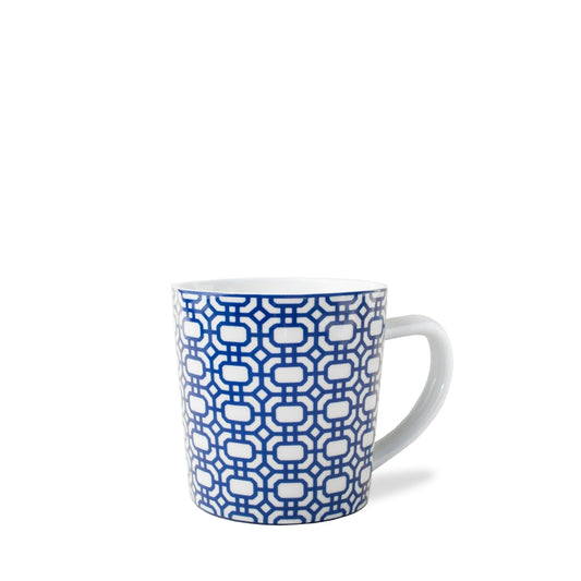 a blue and white cup with a pattern on it