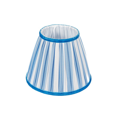 	Separate tapered blue-and-white striped lampshade showing blue trim and its interior