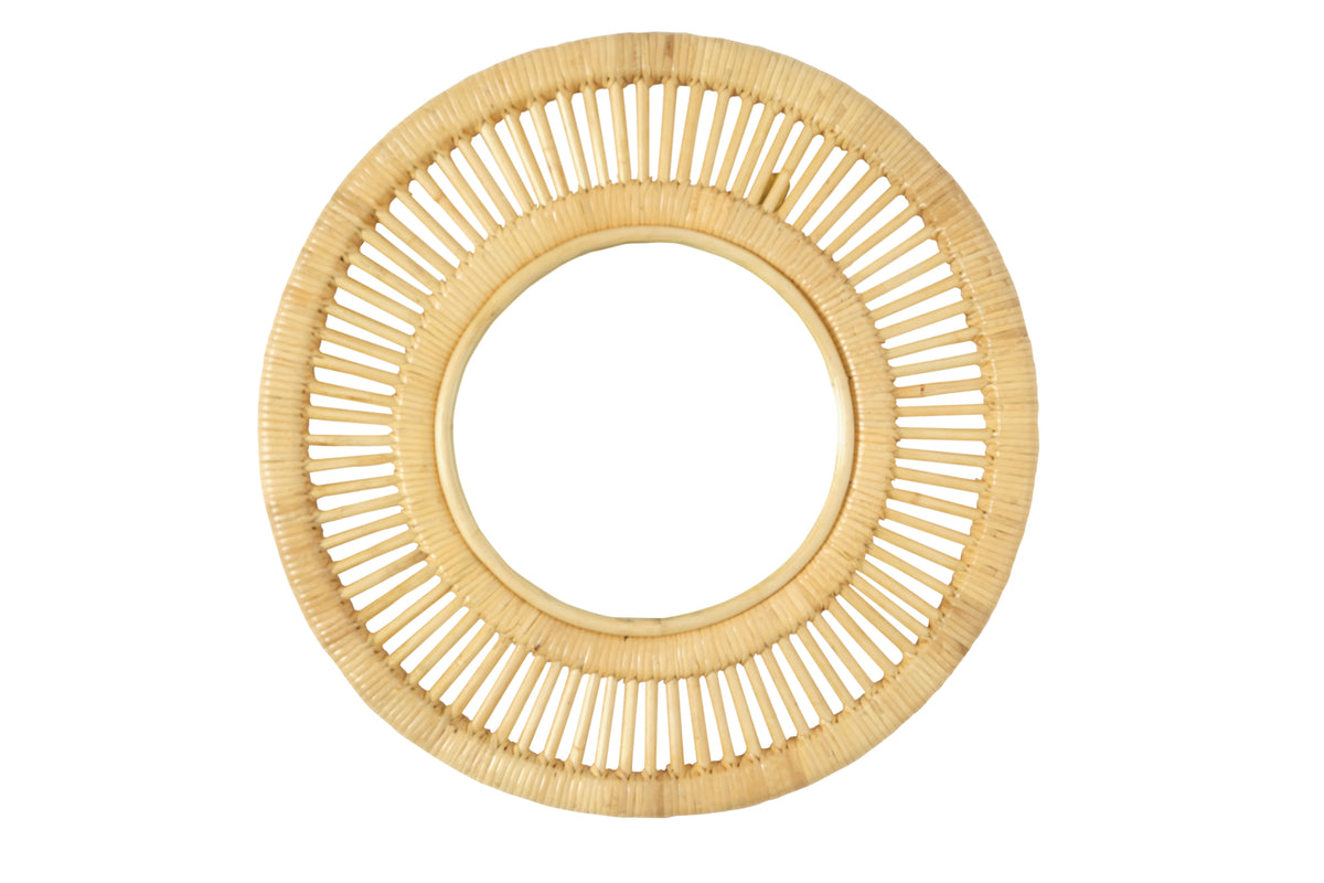 Natural round rattan wall mirror with an open sunburst-style cane frame on a white background