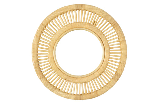 Natural round rattan wall mirror with an open sunburst-style cane frame on a white background