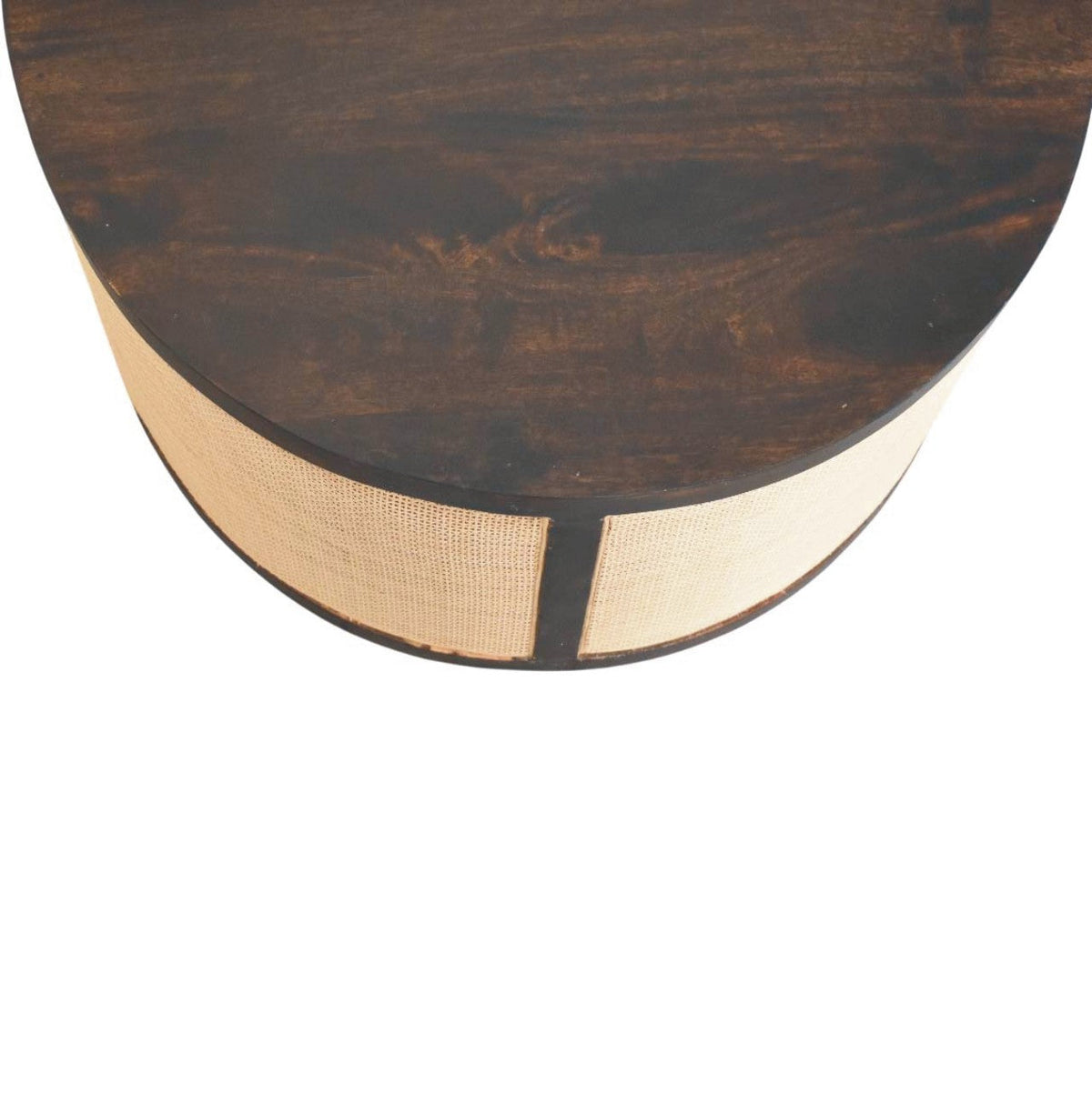 	Elevated view of the Monaco table showing wood grain across the round top and rattan sides