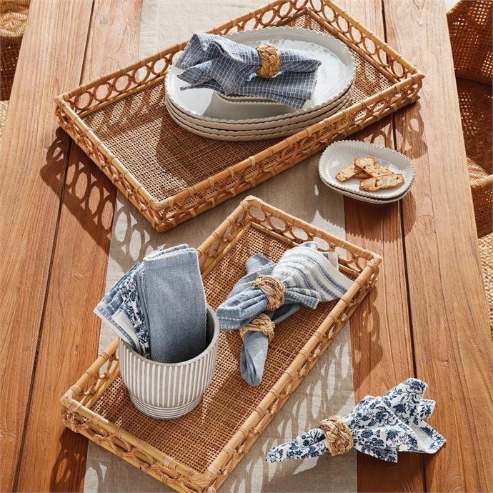 a wooden table topped with baskets filled with dishes