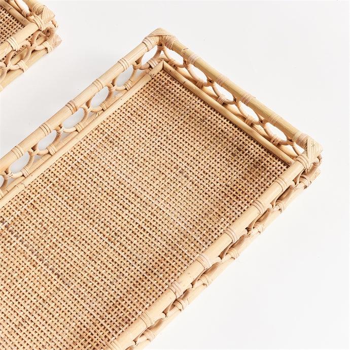 two wicker trays sitting on top of each other