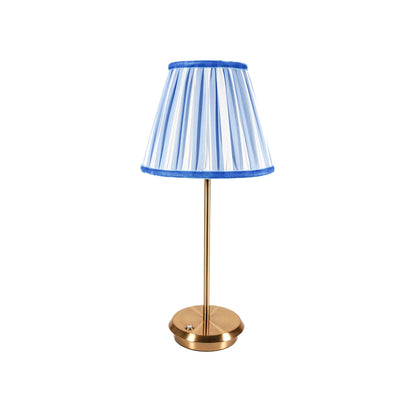 	Blue Velvet Tides table lamp with a blue-and-white striped shade, blue trim, and slender gold-finish base