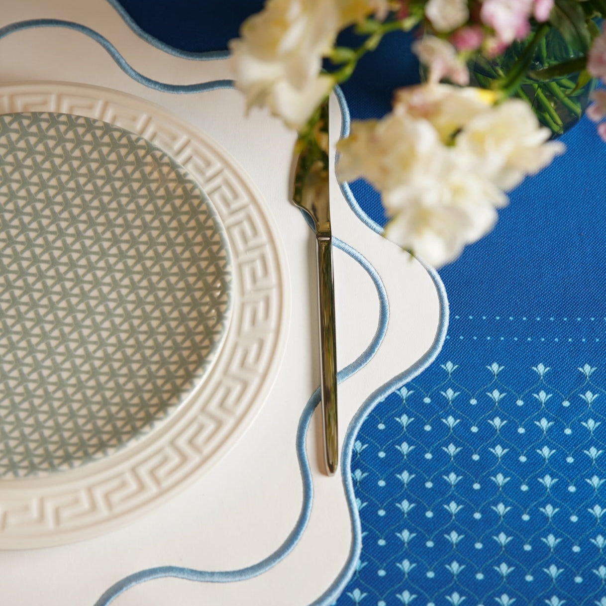 Haven White Wavy Edge Blue Trim Faux Leather Placemat - Coastal Table Decor, Beach House Dining