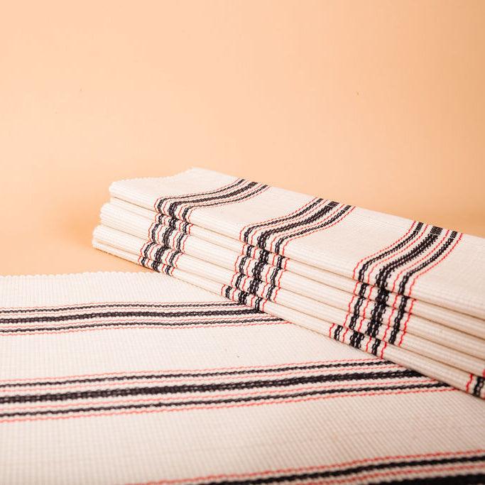 white placemats with navy and red stripes