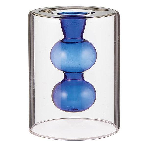 blue glass candle holders inside clear glass