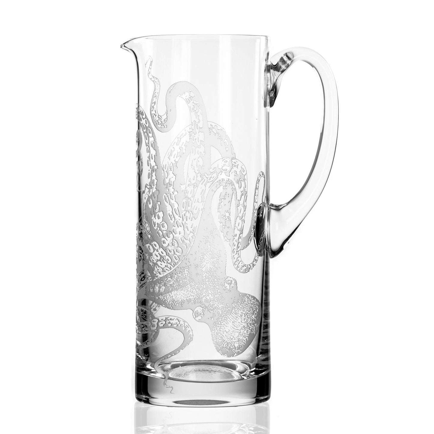 a glass pitcher with an octopus etched on it