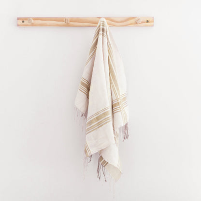 white and beige hand towel