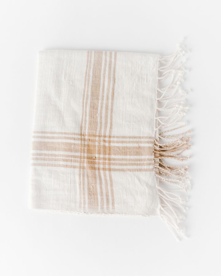 white and beige hand towel