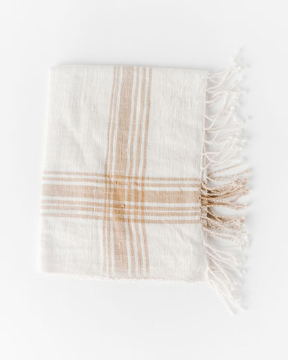 white and beige hand towel